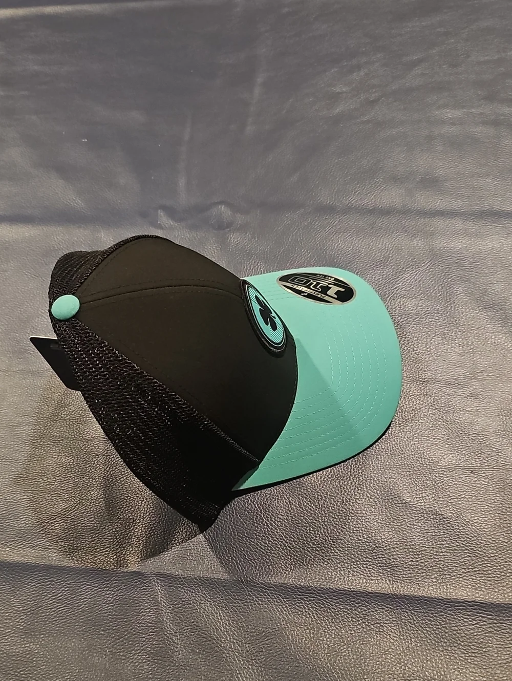 Black and Teal Clover Patch Trucker Hat